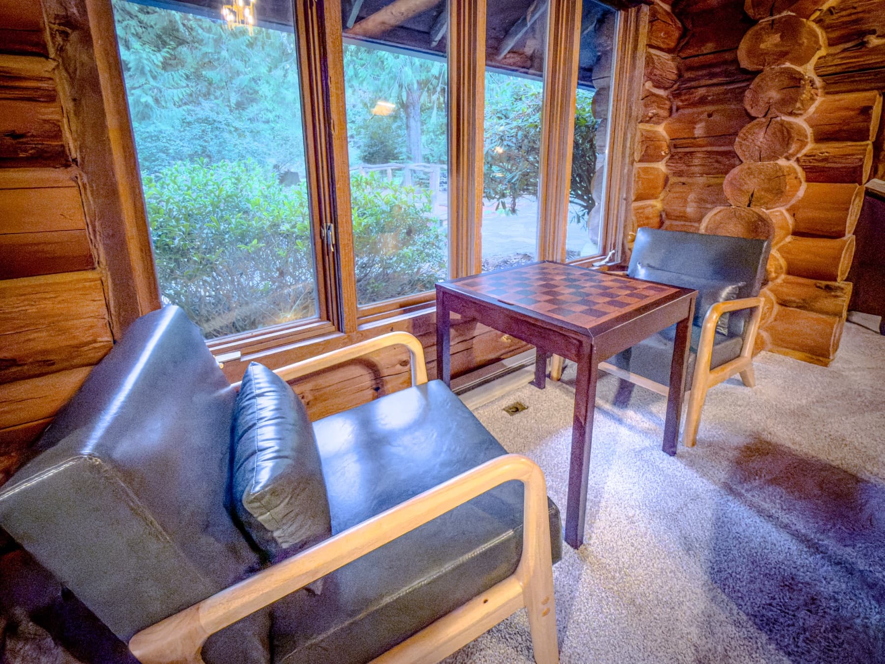 Great room — chess table and fireplace